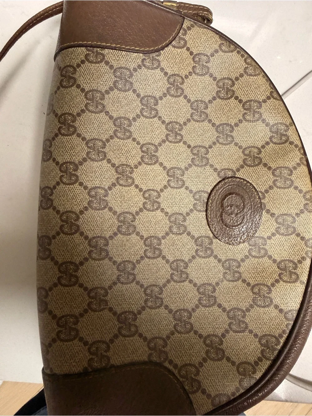 Gucci Gold-Tone Logo Plate on Dark Brown Leather
